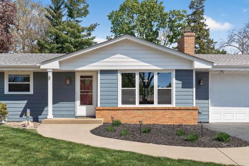 Inviting front entry with updated exterior finishes