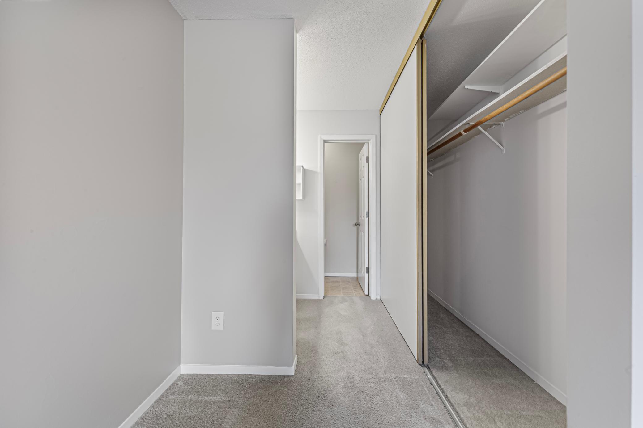 Primary bedroom closets and 1/2 bathroom