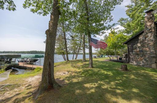 If you are looking for peace and quiet on a nice level lot with sandy shoreline, this may be just what you are looking for.