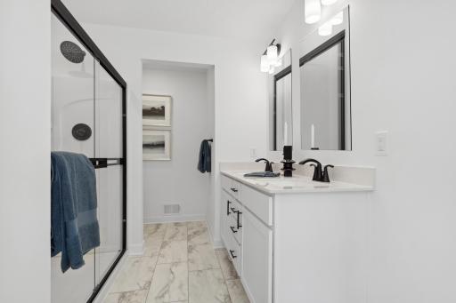Photo is of the actual model. Another angle of the primary bath!