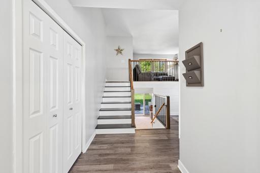 Entering into the main floor with updated flooring