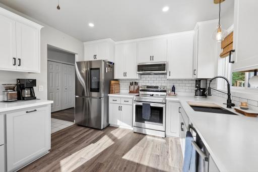 This kitchen has been completly redone by the owners, adding new cabinetry, appliances, backsplash, and flooring