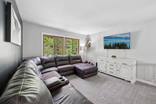 The upstairs living area is big enough for numerous arrangements furniture and set-ups