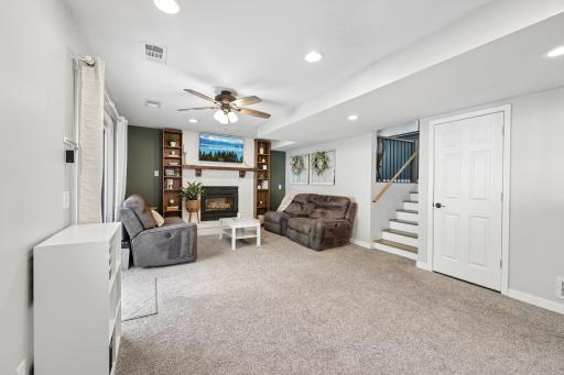 The downstairs living area with plush carpet installed