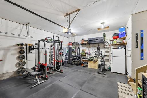 This garage has been outfitted for the health and weallness community. Pefectly insulated for the winter through summer months. The flooring mats can be left behind for future gym use, or for easy cleanup from messy Minnesota Winters