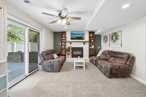 Enjoy cozy evenings next to the gas fireplace and built in shelving