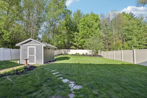 Enjoy walking out to your private wooded and fenced backyard
