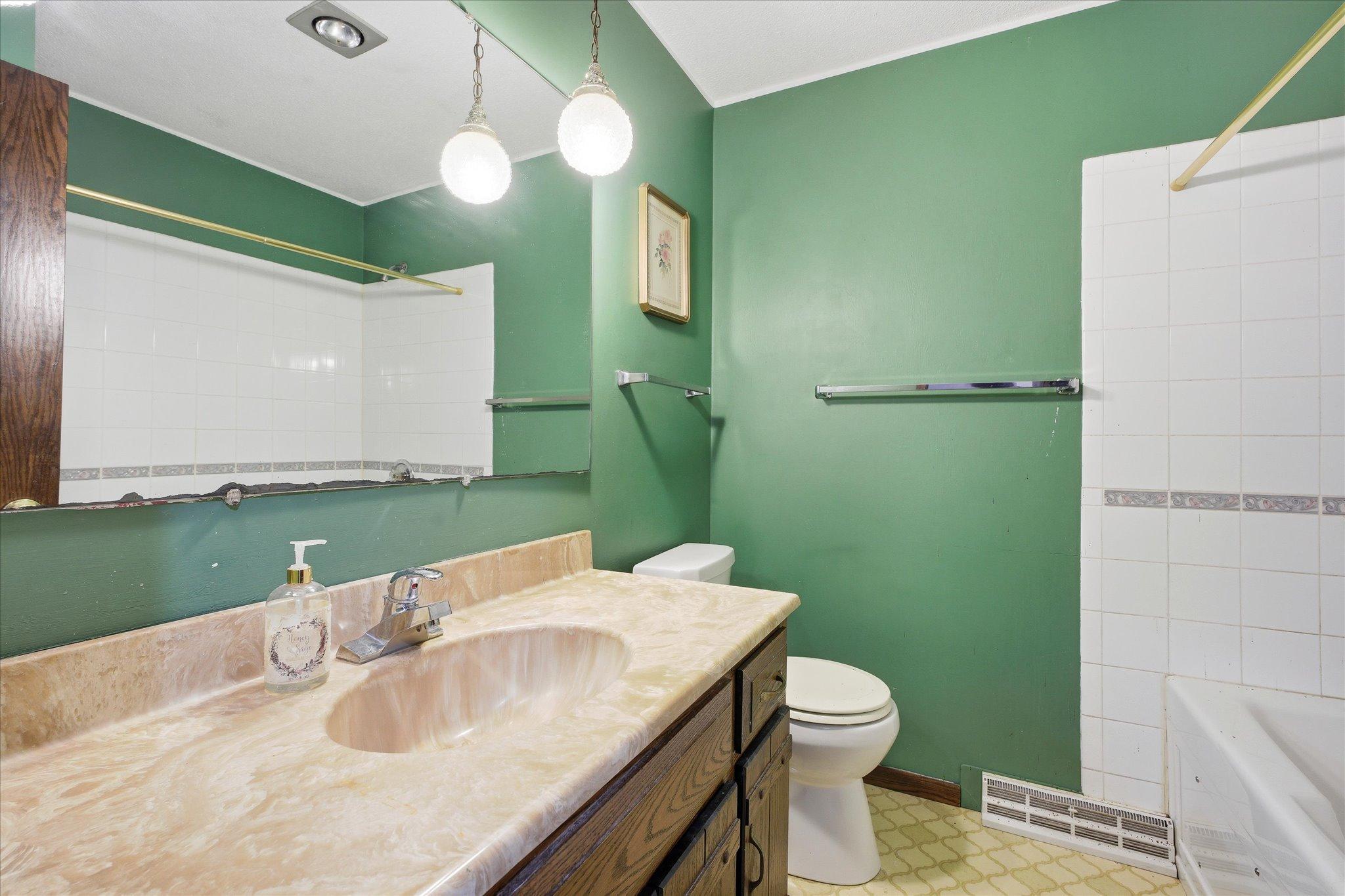Main level of the home includes a full bath.