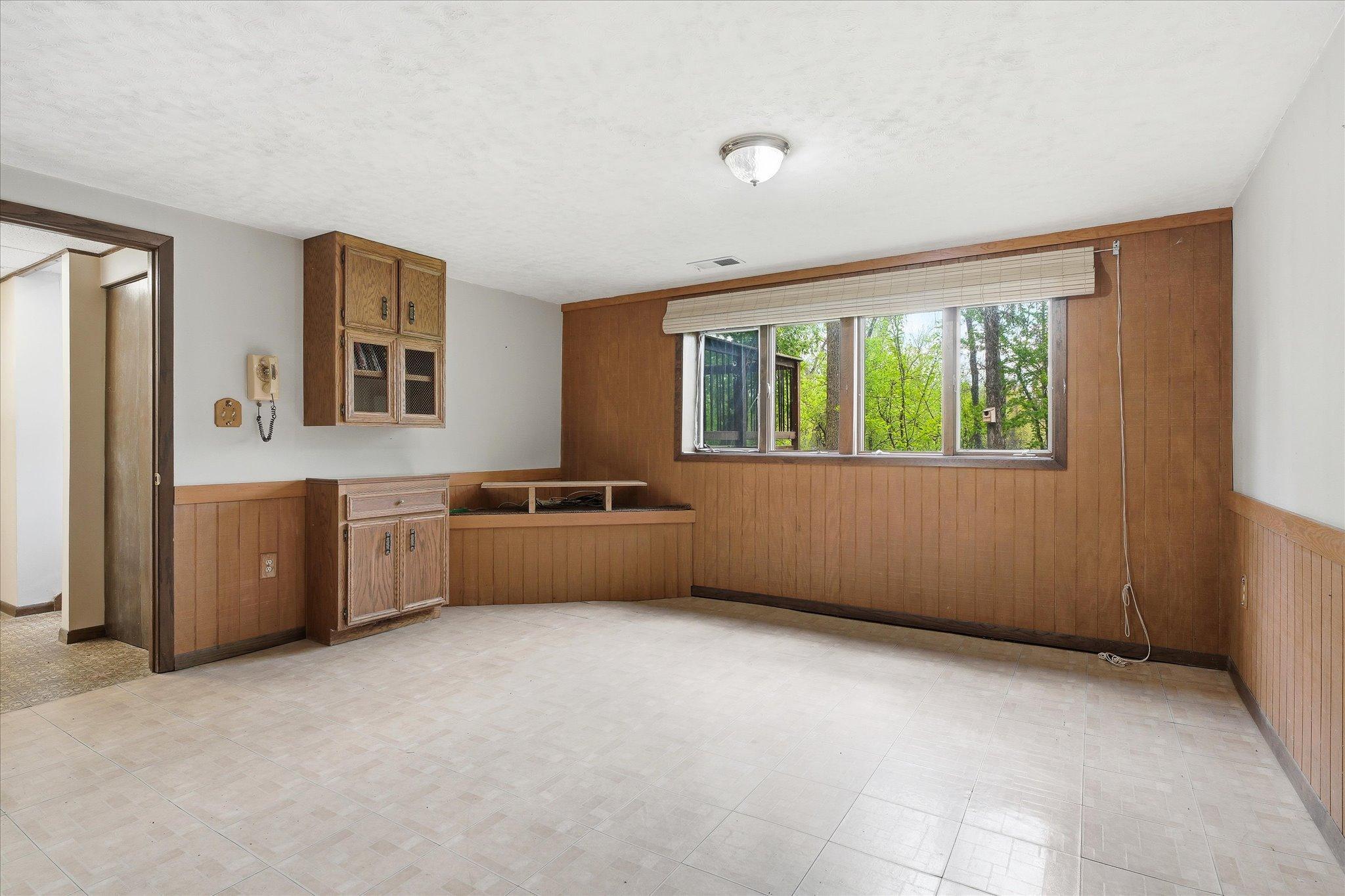 The corner built in is perfect for a TV and cabinets are included for storage needs.