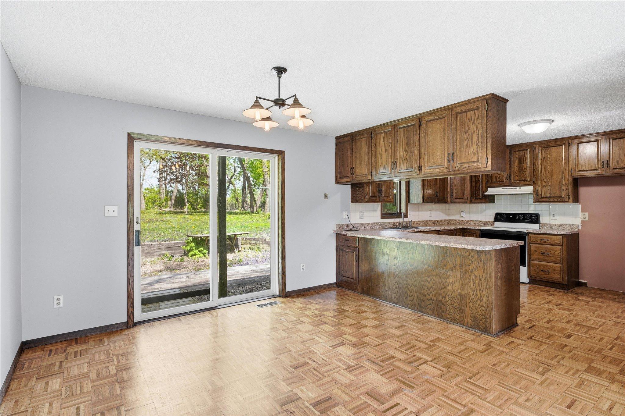 The open dining and kitchen area is ideal for meal times and gatherings.