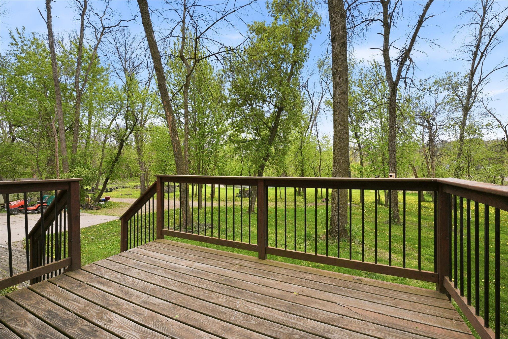 The large deck on the front of the home is perfect to enjoy your morning coffee or reading a good book.