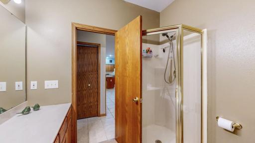 Separate shower, linen closet in the hallway