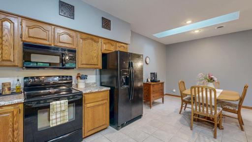 Large kitchen and dining rooms, new skylight in the dining room brings in wonderful natural light.