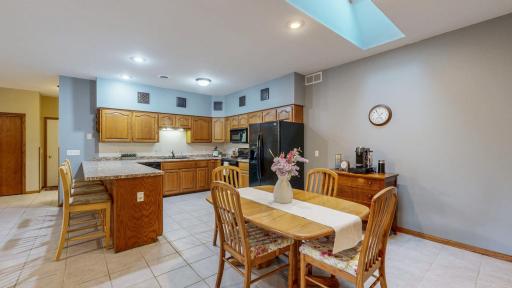Plenty of space in the dining room for your hutch or coffee station!