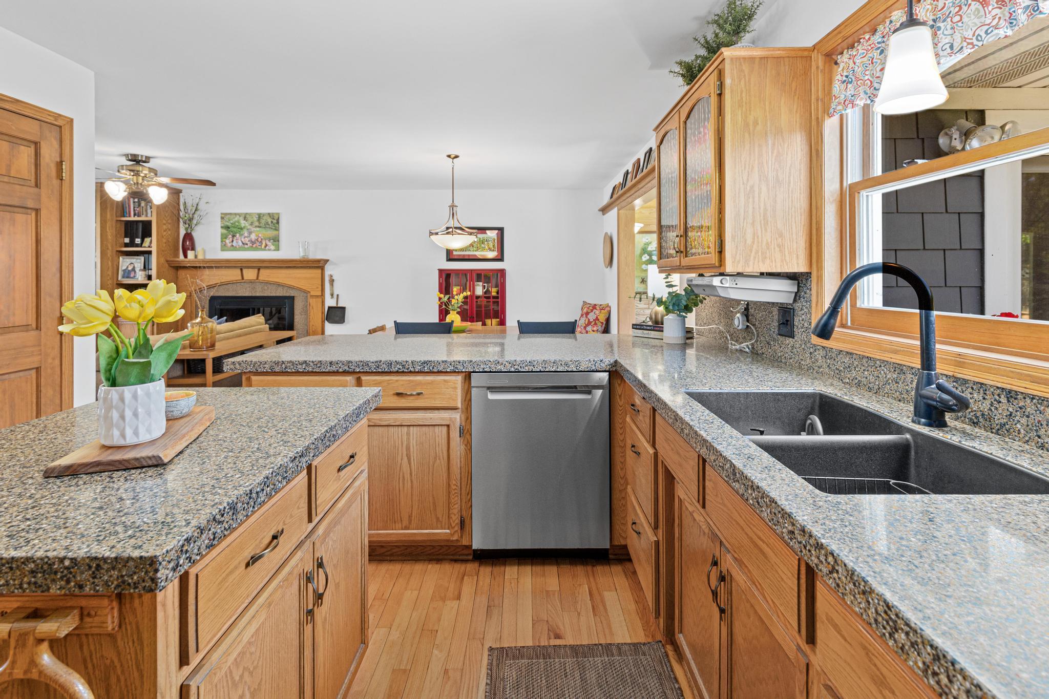 The heart of the home — this kitchen is filled with natural light, warm finishes, and inviting spaces perfect for everyday living and entertaining.