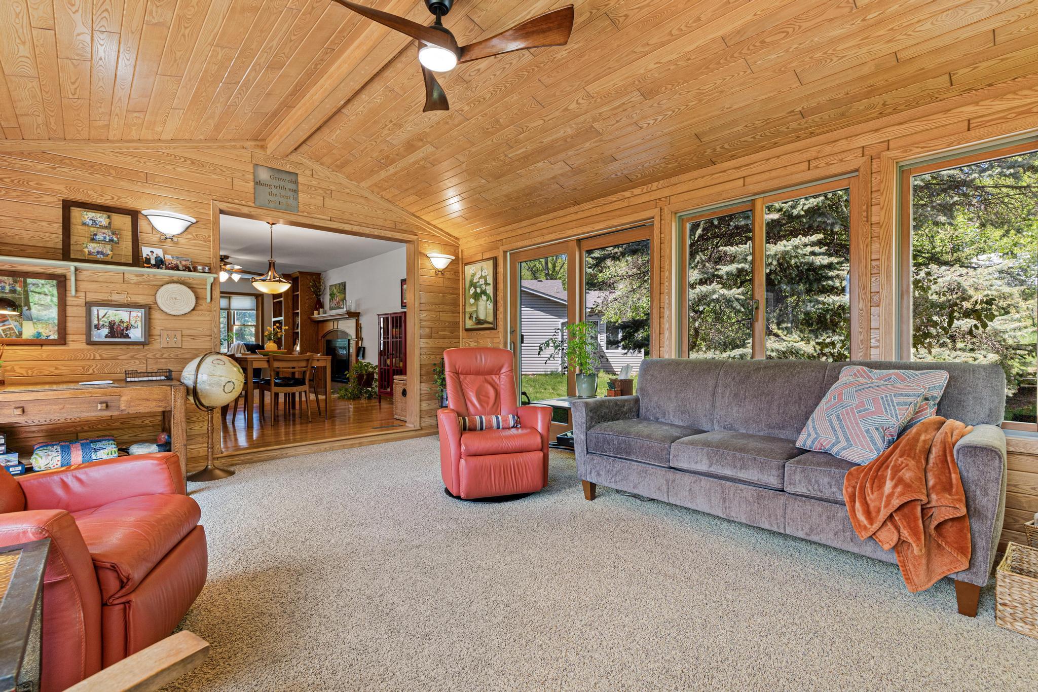 Four-season porch just off the dining area offers the perfect extension of living and entertaining space year-round.