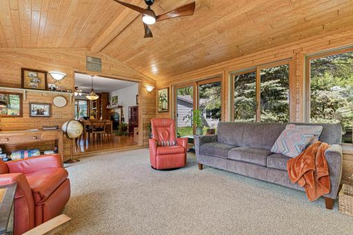 Four-season porch just off the dining area offers the perfect extension of living and entertaining space year-round.