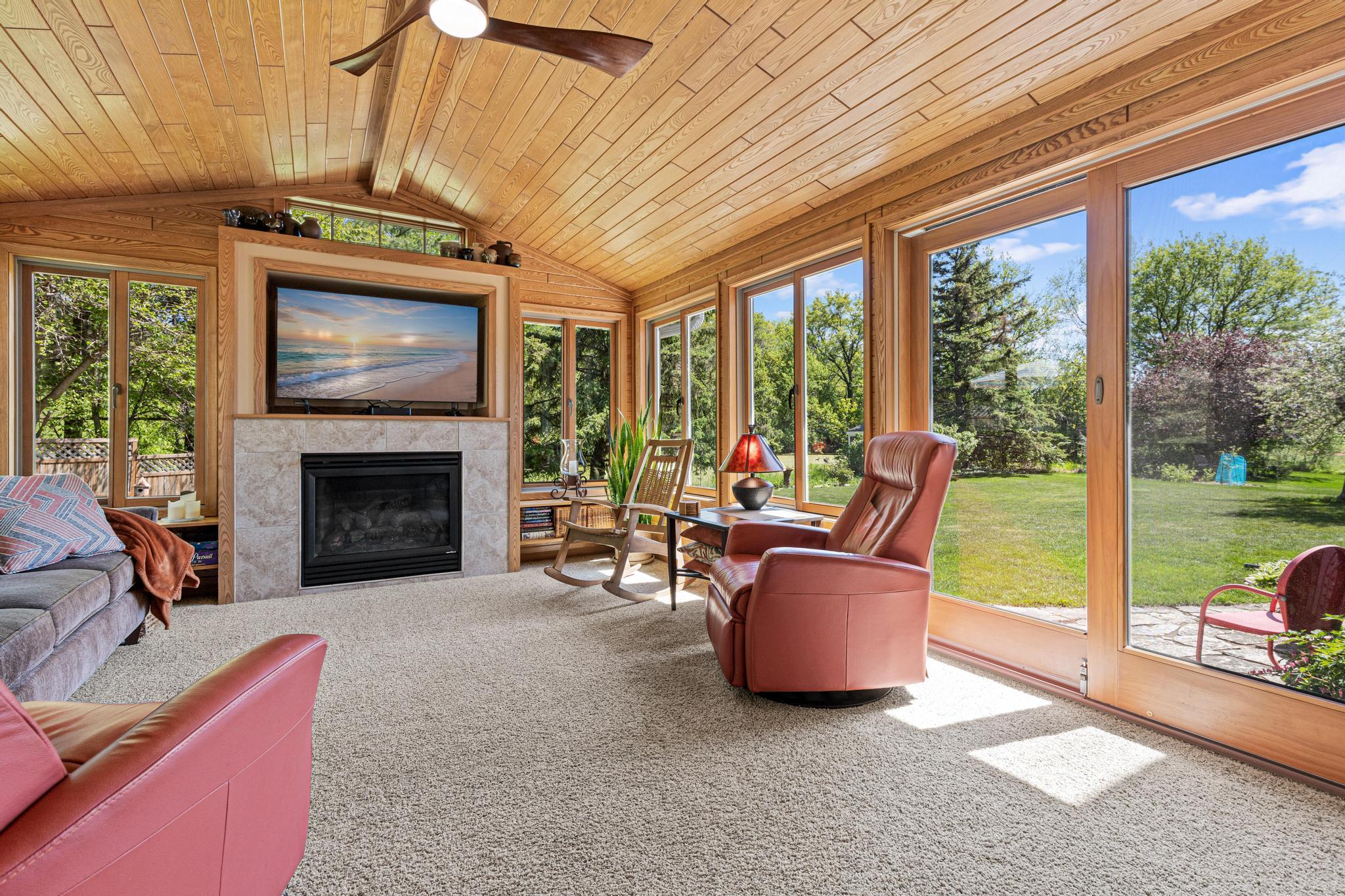 Relax and unwind while enjoying peaceful backyard views year-round. Snuggle up with your favorite book or watch the big game in this wonderful space.
