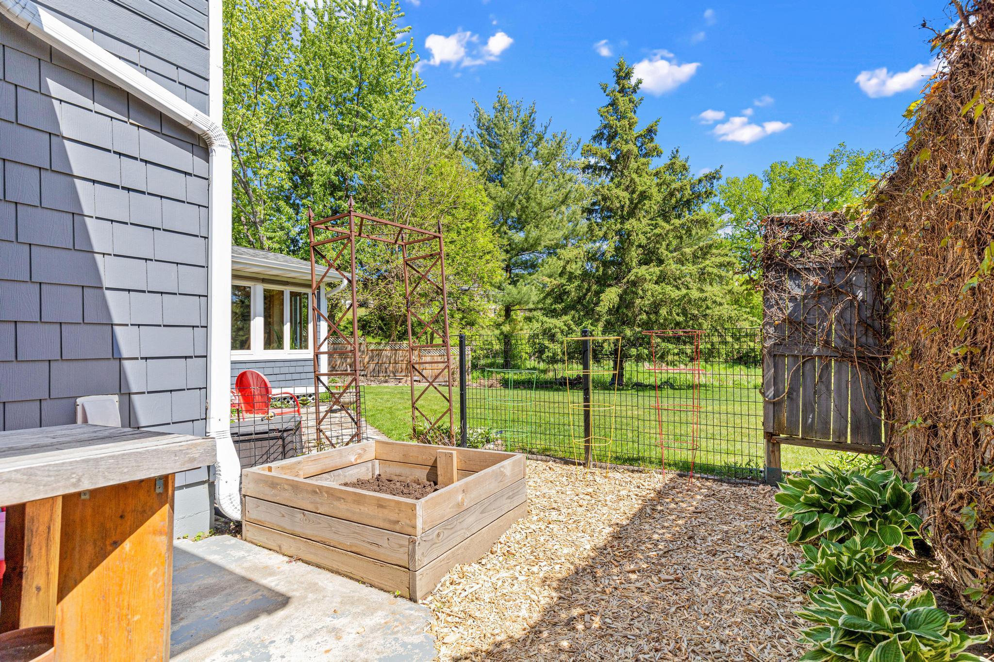 Incredible flat backyard with room to play, garden, or simply enjoy the outdoors.