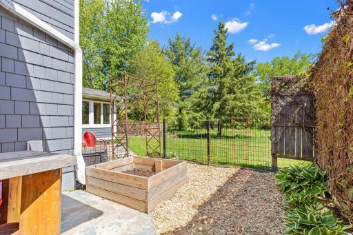 Incredible flat backyard with room to play, garden, or simply enjoy the outdoors.