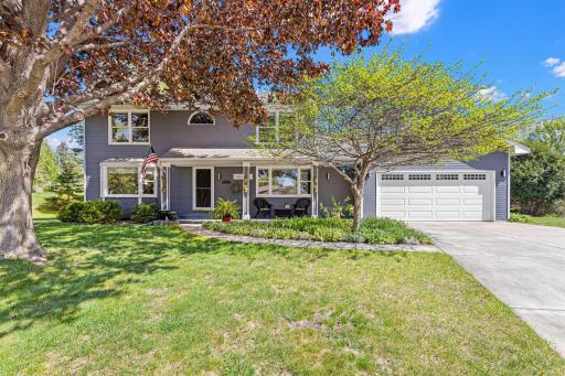 Welcome home to this beautifully maintained two-story tucked away on a private cul-de-sac.