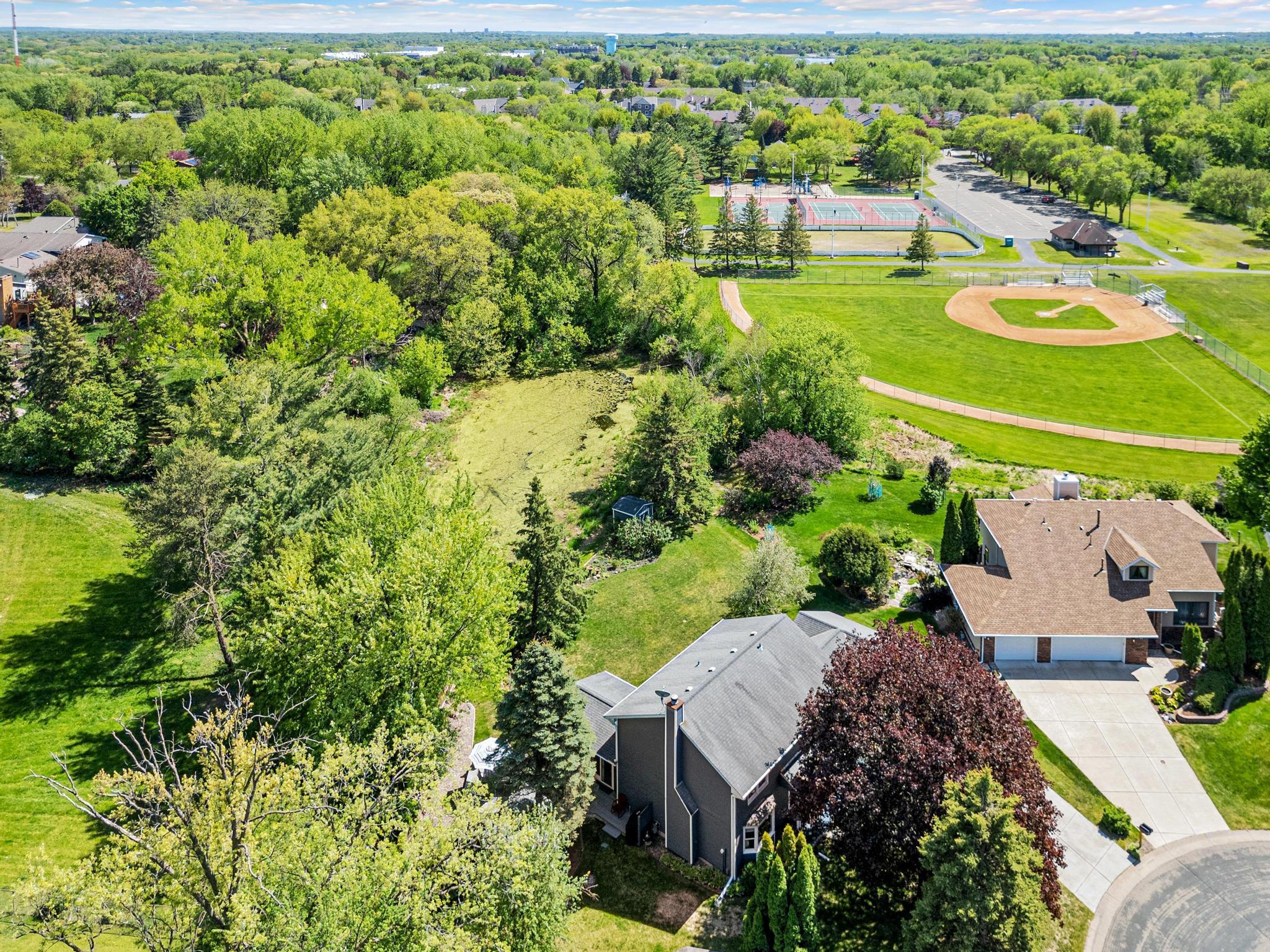 A truly special home offering comfort, space, and incredible backyard views. Wilson Park in the background.