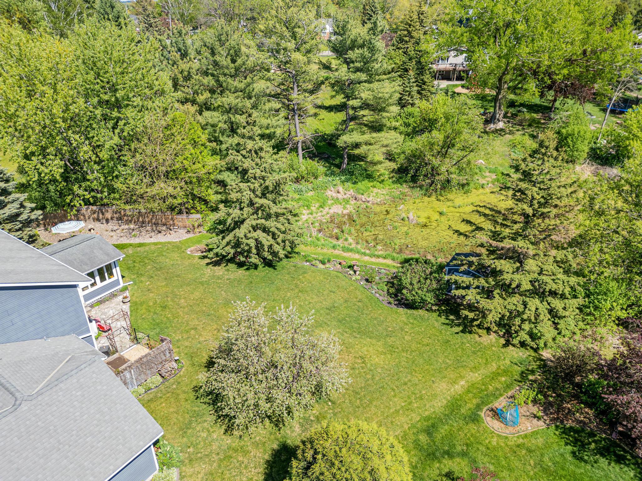 Scenic pond views create a tranquil backdrop to this amazing property.