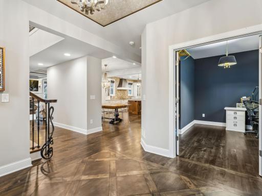 Large open foyer, door to the right leads to office