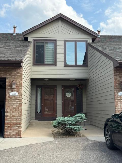 Front of home with 2 doors.jpeg