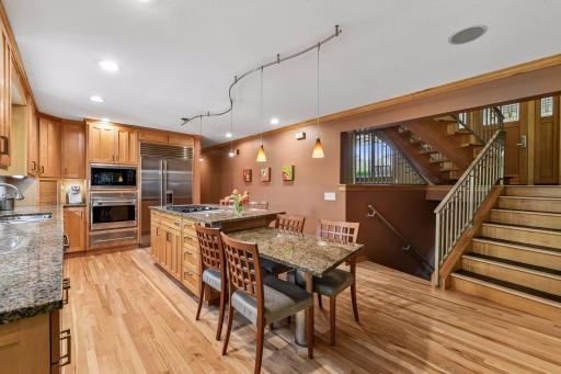 High voltage lighting accents the eating/cooking area.