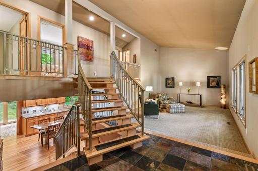 Slate main entry. Custom stairs and railing.