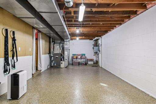 New epoxy in 42 x 12 storage/utility area (not included in fsf calculation). New water heater and AC in 2024. Furnace maintenance/serviced in 2026.