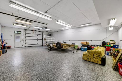 920 sq feet w 10 ft wide doors. New epoxy, compressed air line, heated, 400 amp service. HUGE! Sport court possibility...