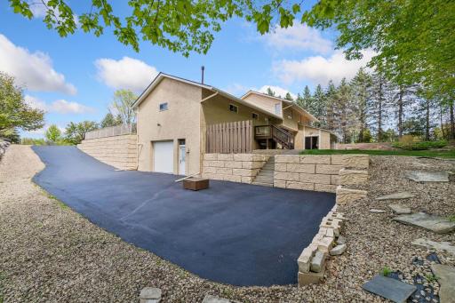 Lower spancrete garage w 10 ft wide door. Plenty of space for turn arounds and parking.