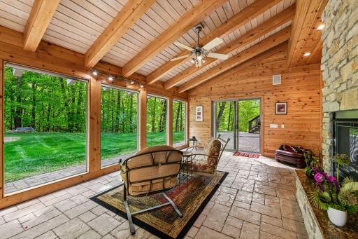 Double patio doors, colored/stamped concrete floor w in-floor Wirsbo heat.