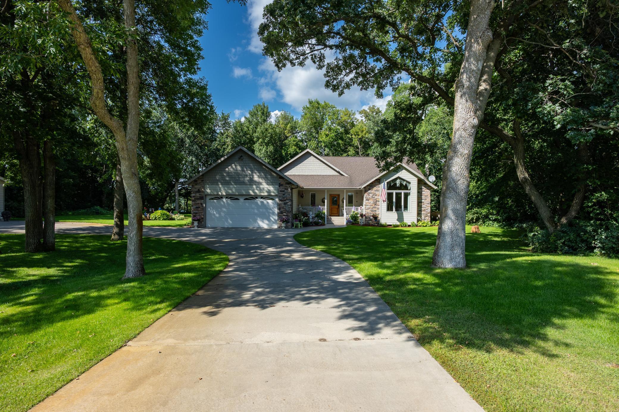 Fabulous home on .99 acre wooded and private