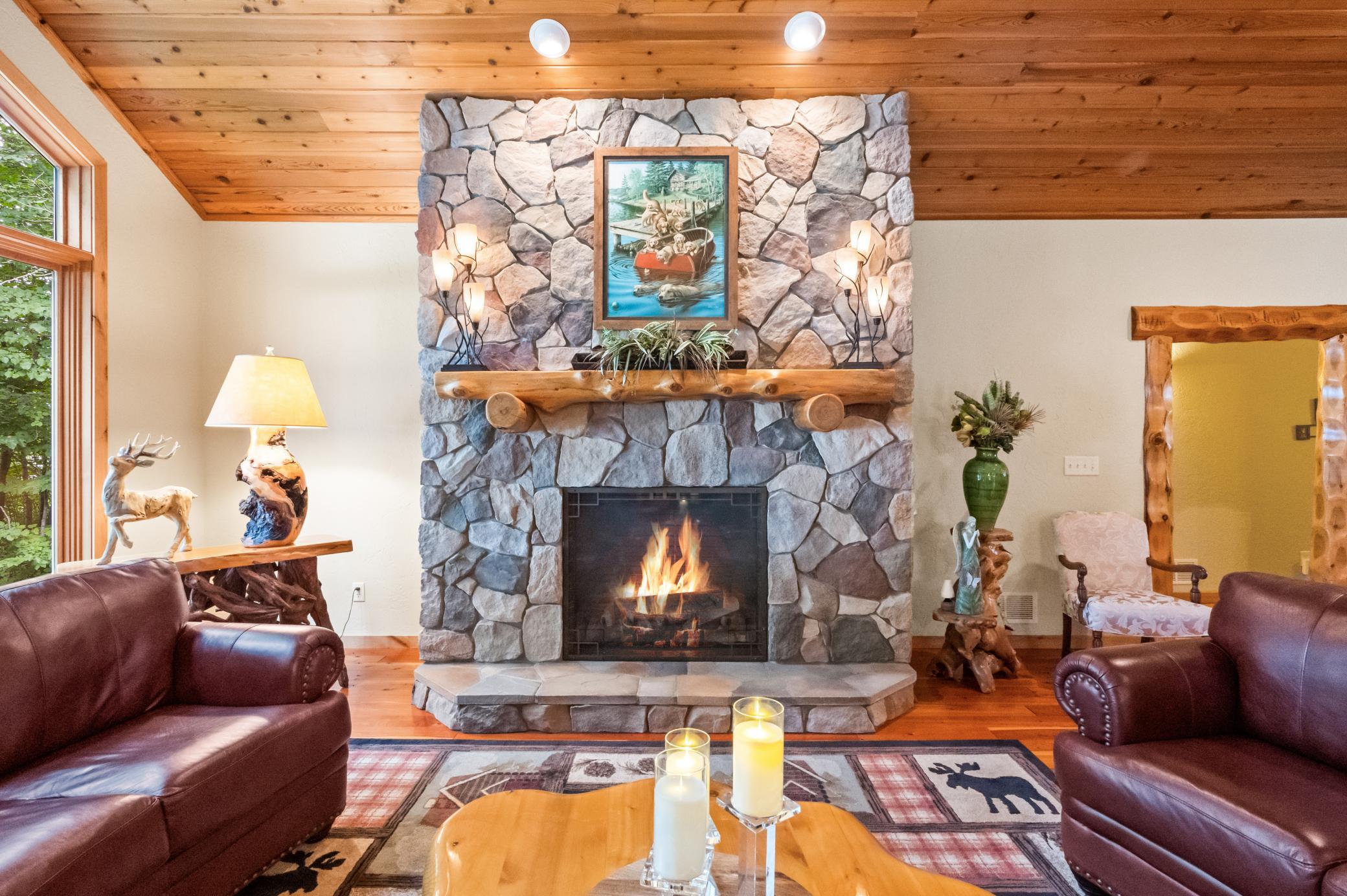 Gorgeous floor to ceiling Stone gas fireplace