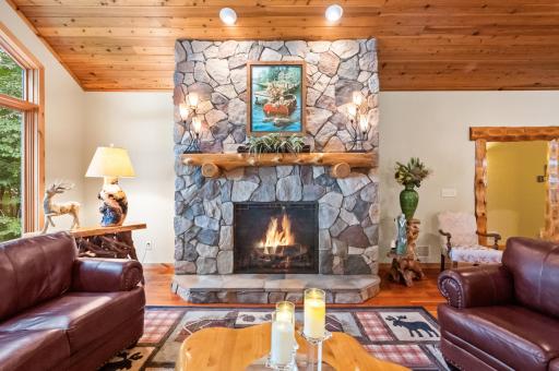 Gorgeous floor to ceiling Stone gas fireplace