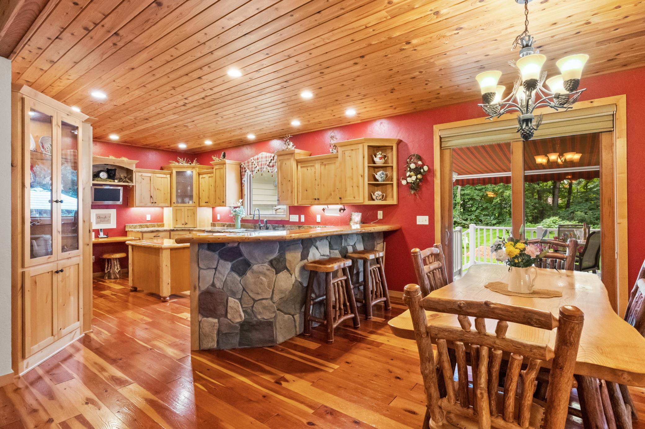 Stone bar Island with beautiful custom countertop.
