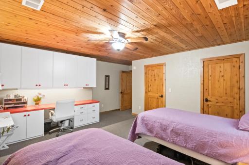 Built-in desk and cabinets and double closet in 3rd bedroom