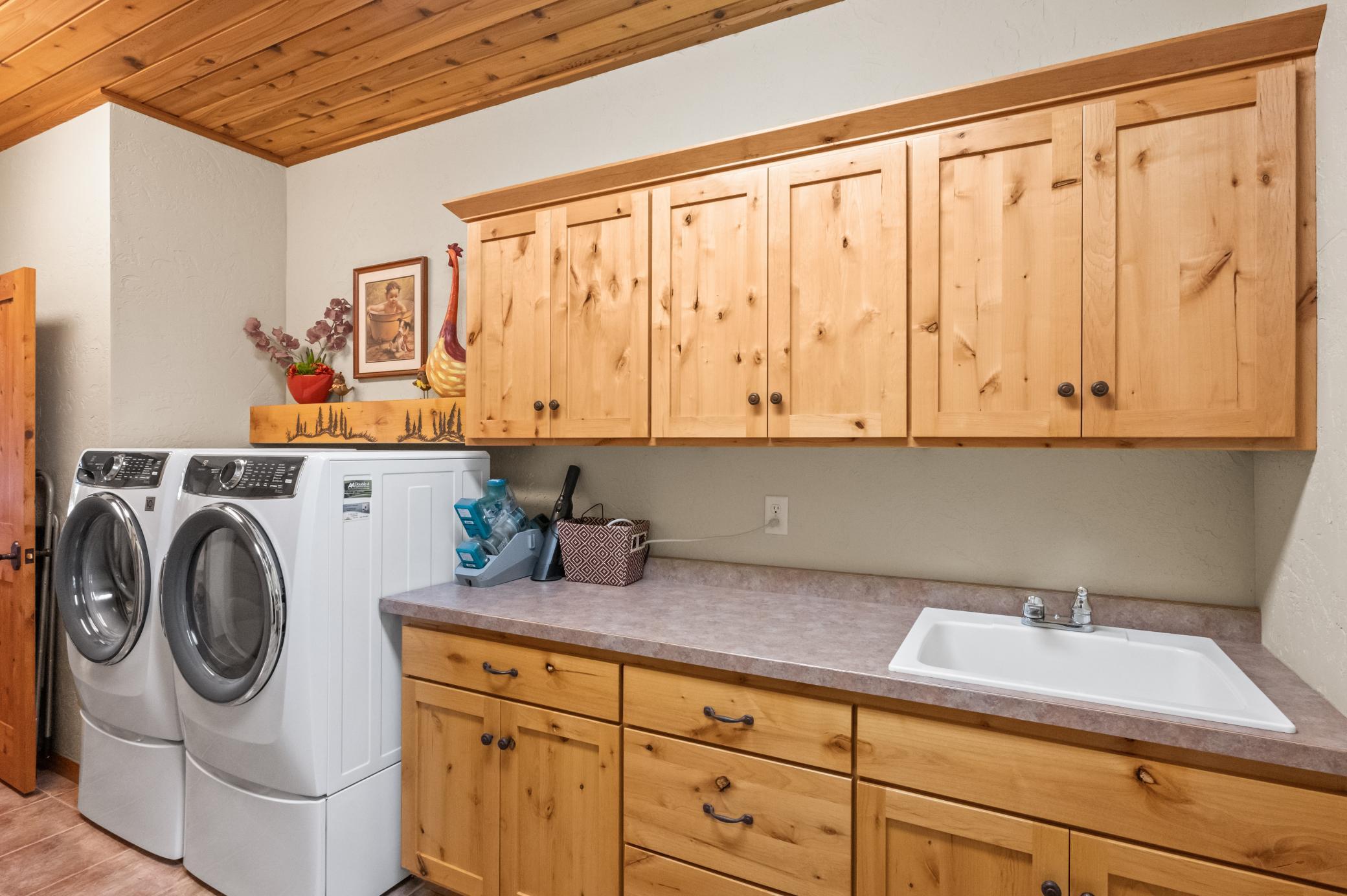 Great cabinets and laundry sink