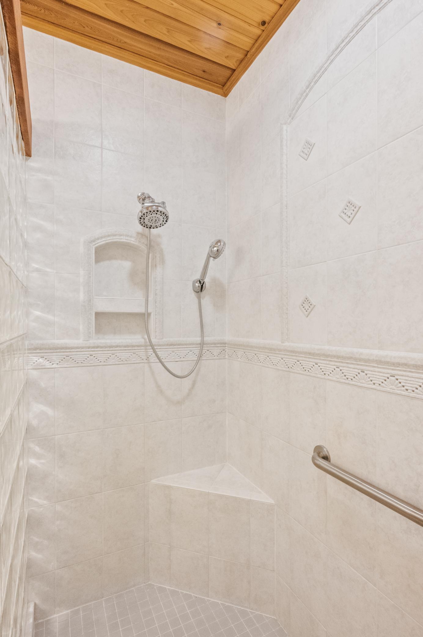 Separate tiled shower in Owner's Bath