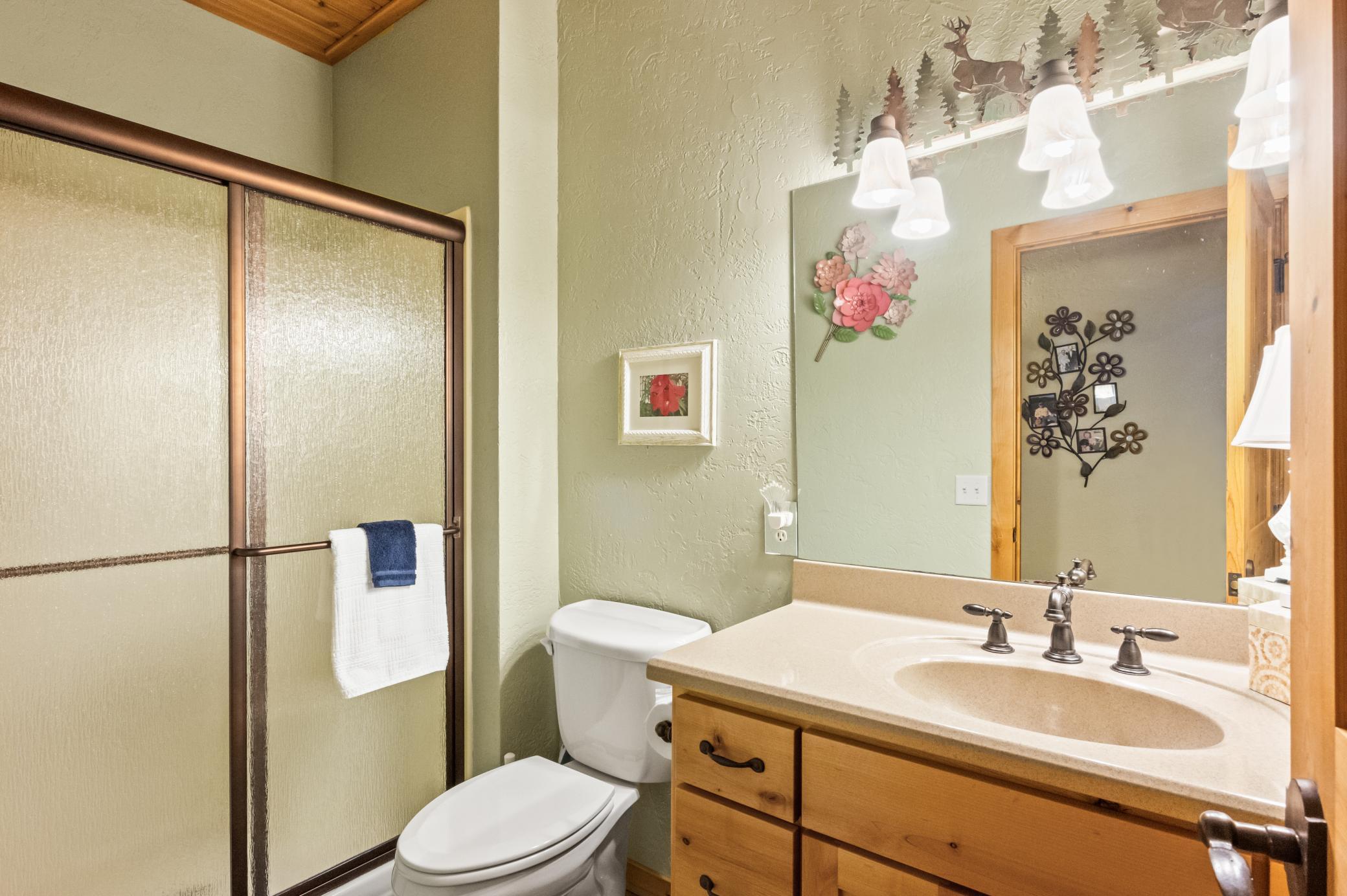 Main floor 3/4 bath with a shower