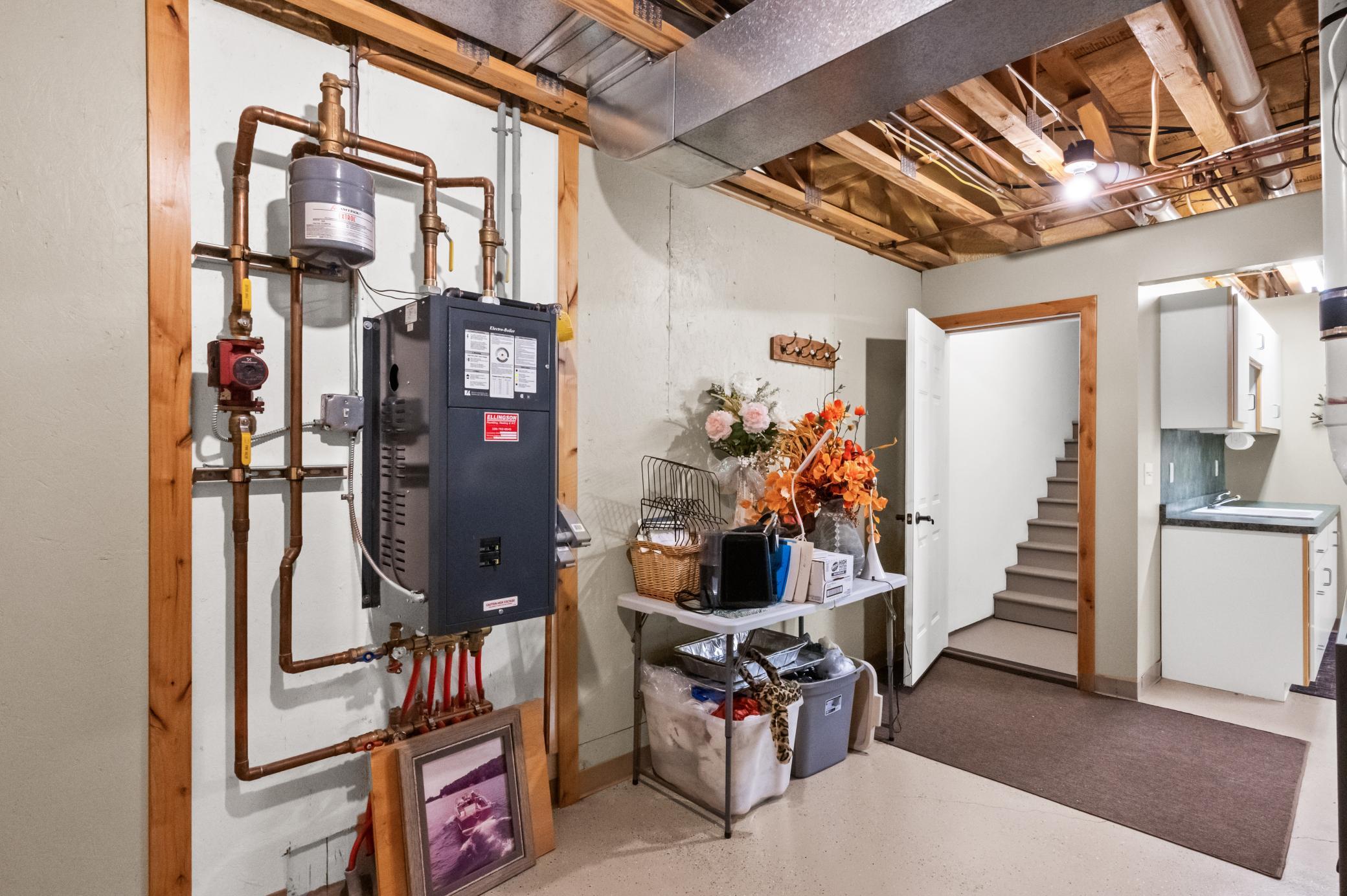 In-floor heat with steps coming from Garage to LL