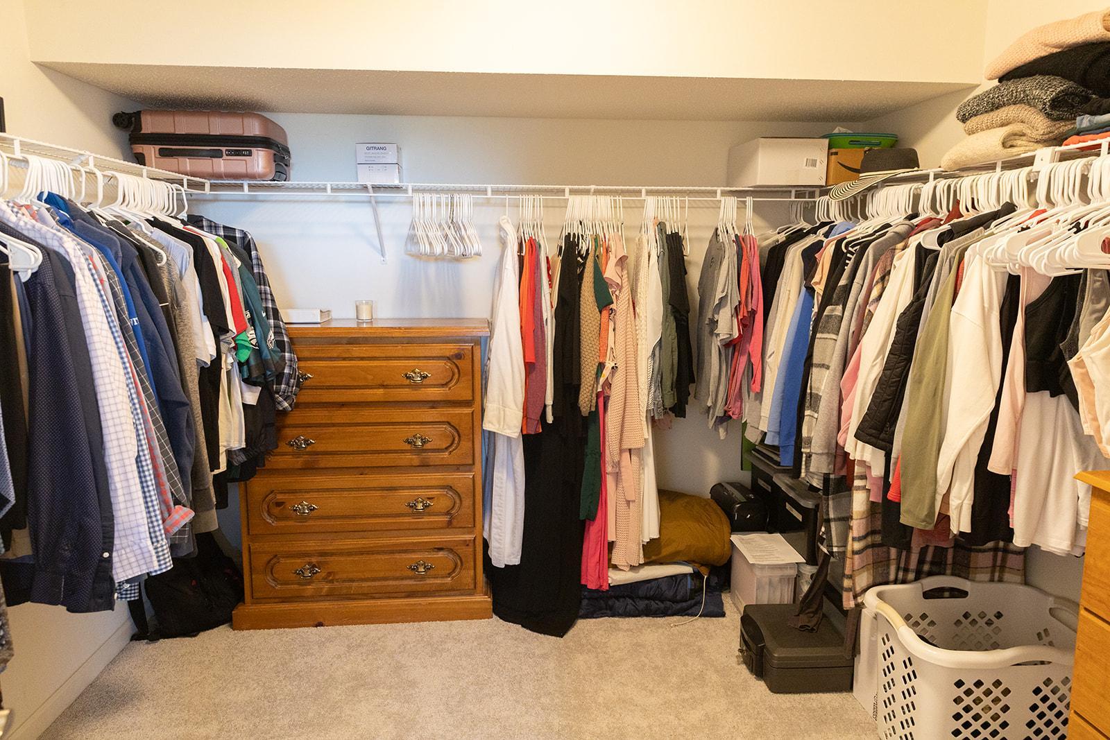 Generous primary walk-in closet.