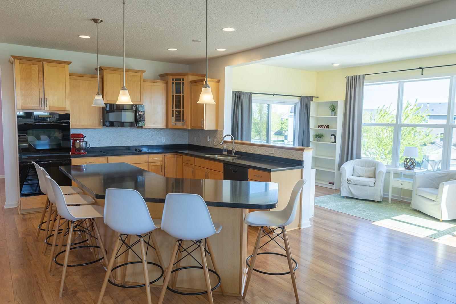 Large kitchen with lots of seating at the island.