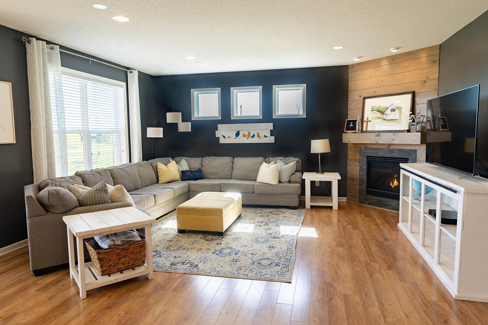 Warm and inviting living room with a cozy gas fireplace for those chilly nights.