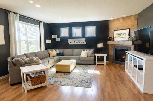 Warm and inviting living room with a cozy gas fireplace for those chilly nights.