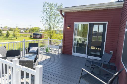 This sweet perch off the morning room is the perfect observation deck of this beautiful yard.