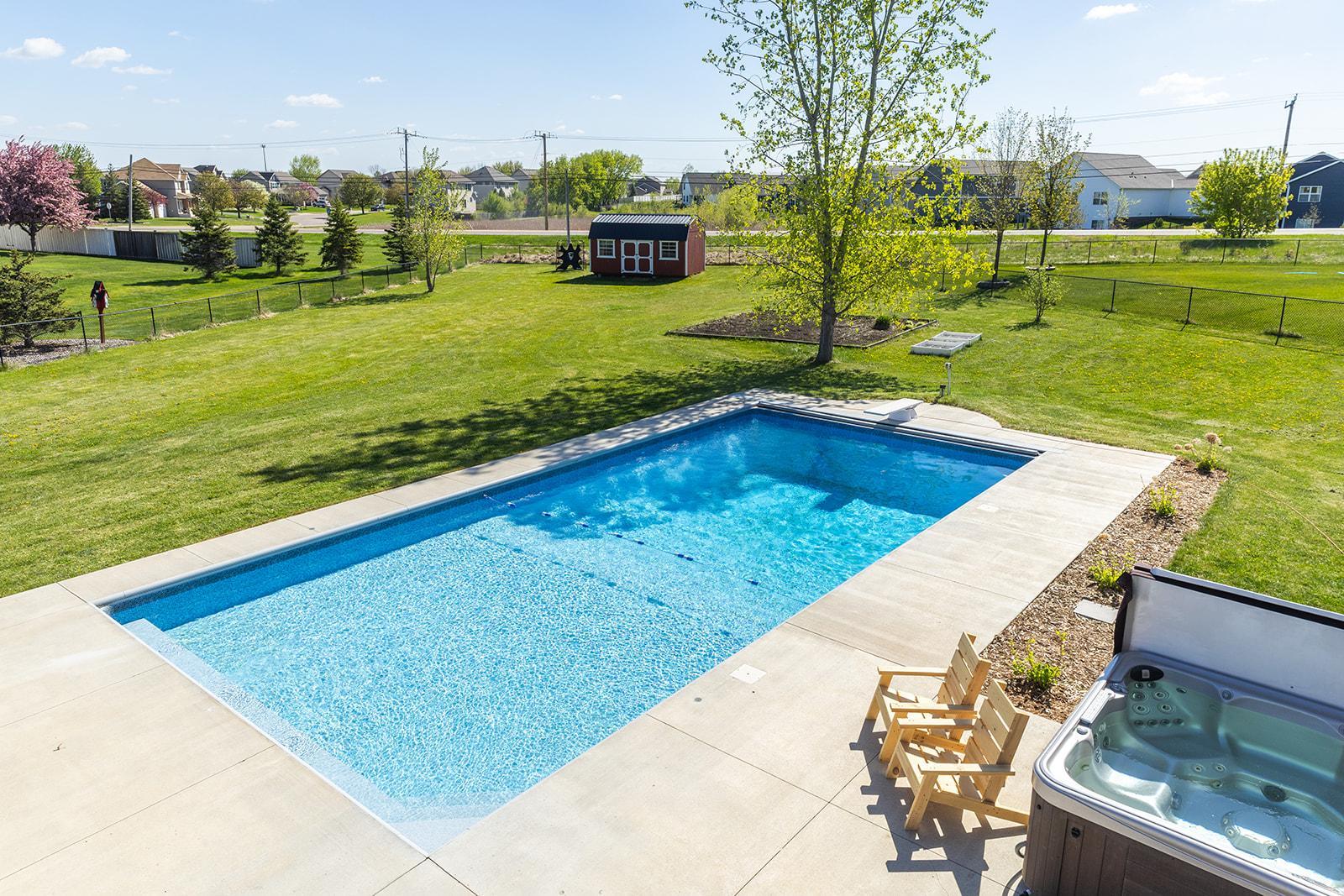 Plenty of space to garden and run around on this spacious .72 acre lot. Yes, it is fenced!